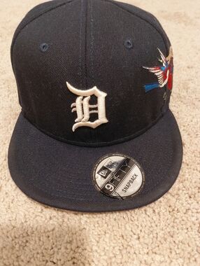 Genuine Merchandise Black Cap with Red, White & Blue MLB Logo